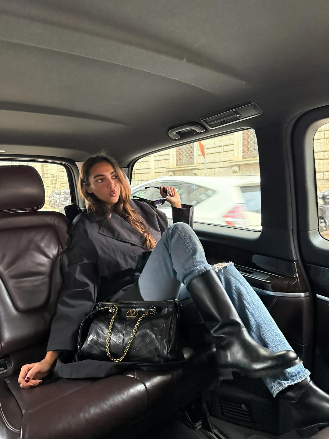 woman wearing best fall denim outfit november 2025