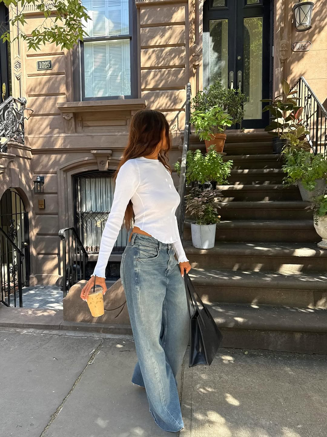 woman wearing fall denim trend 2025