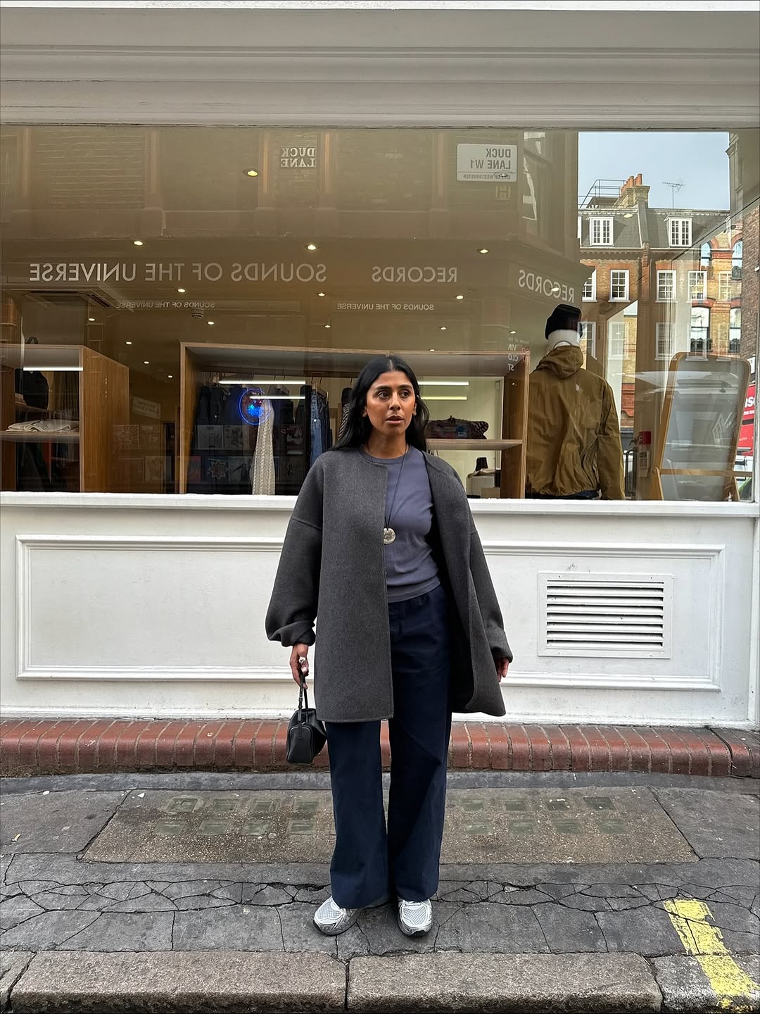 woman wearing winter sneaker outfit 2025