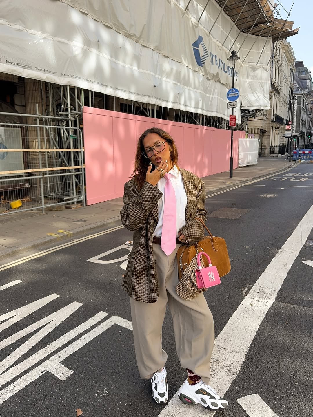 woman wearing winter sneaker outfit 2025