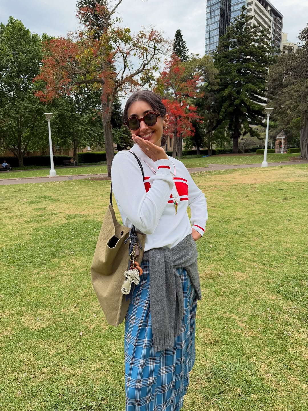 woman wearing plaid maxi skirt outfit 2025