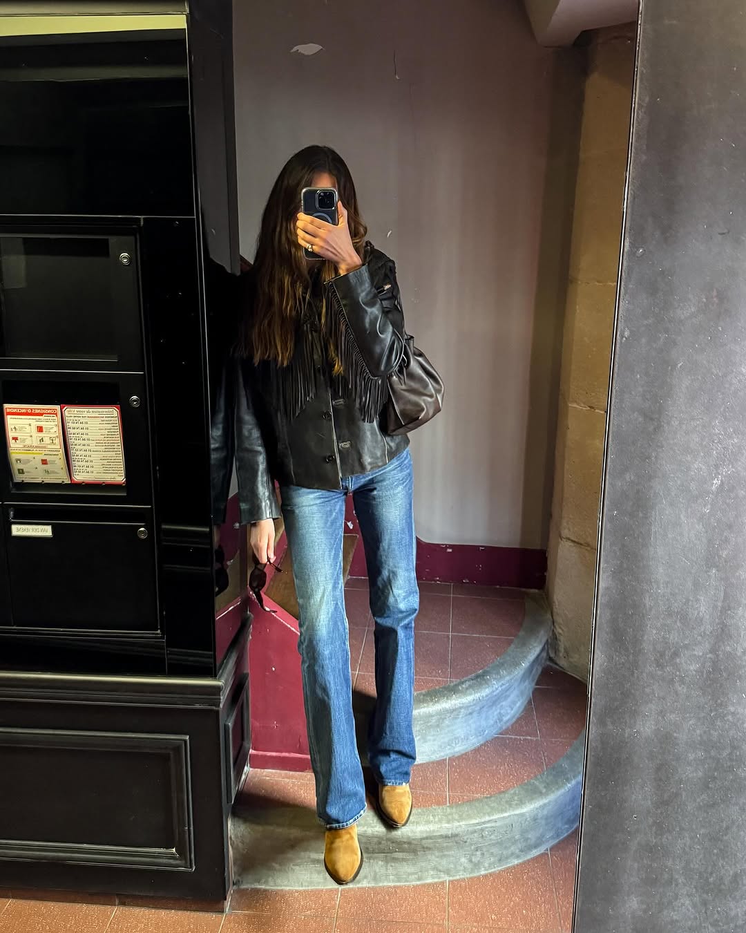 woman wearing suede pointed toe ankle boots trend 2025