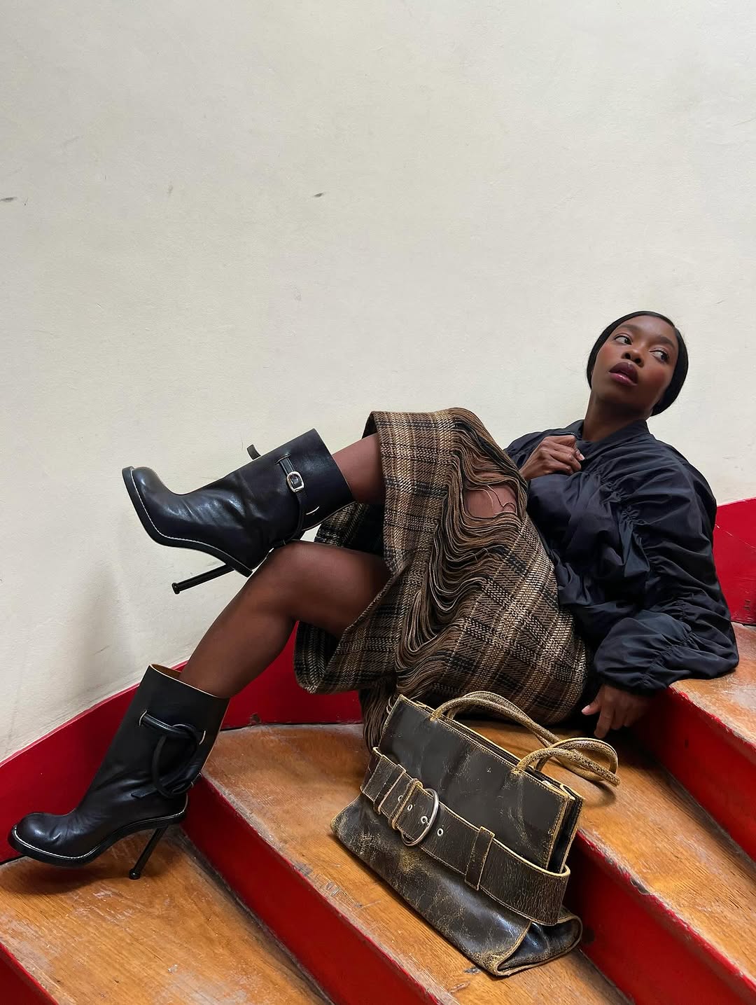 woman wearing plaid maxi skirt outfit 2025