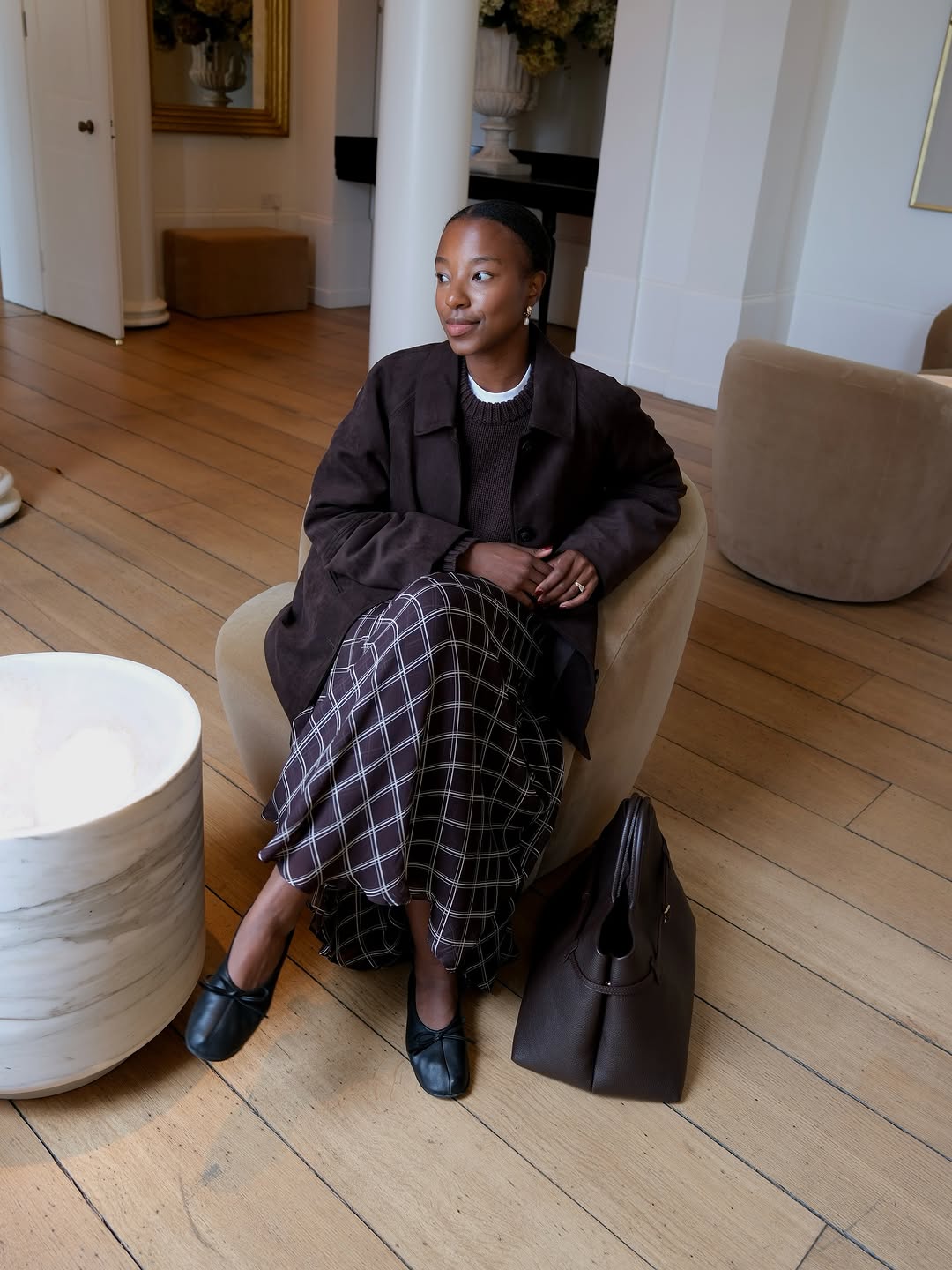 woman wearing plaid maxi skirt outfit 2025