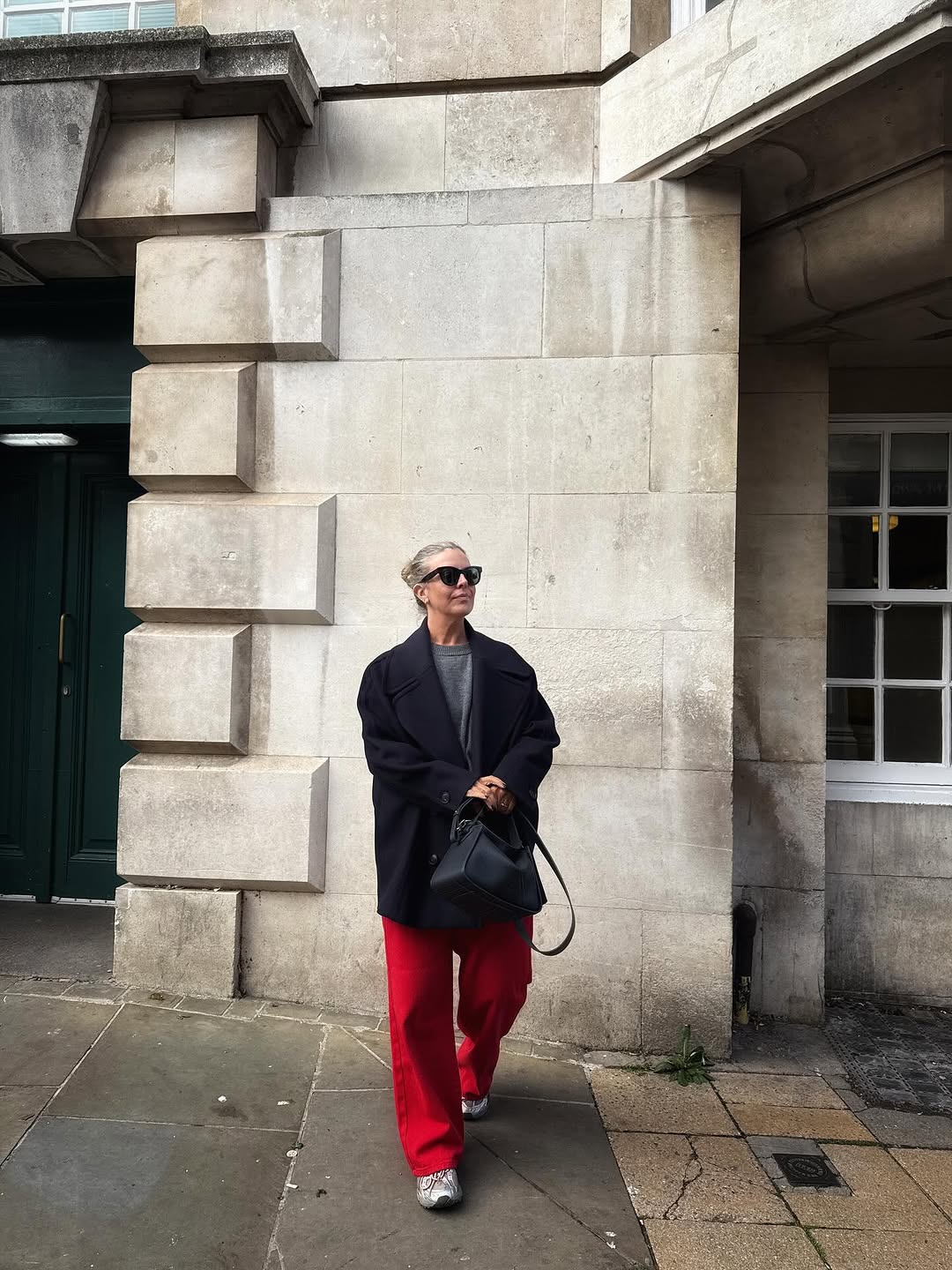 woman wearing winter sneaker outfit 2025