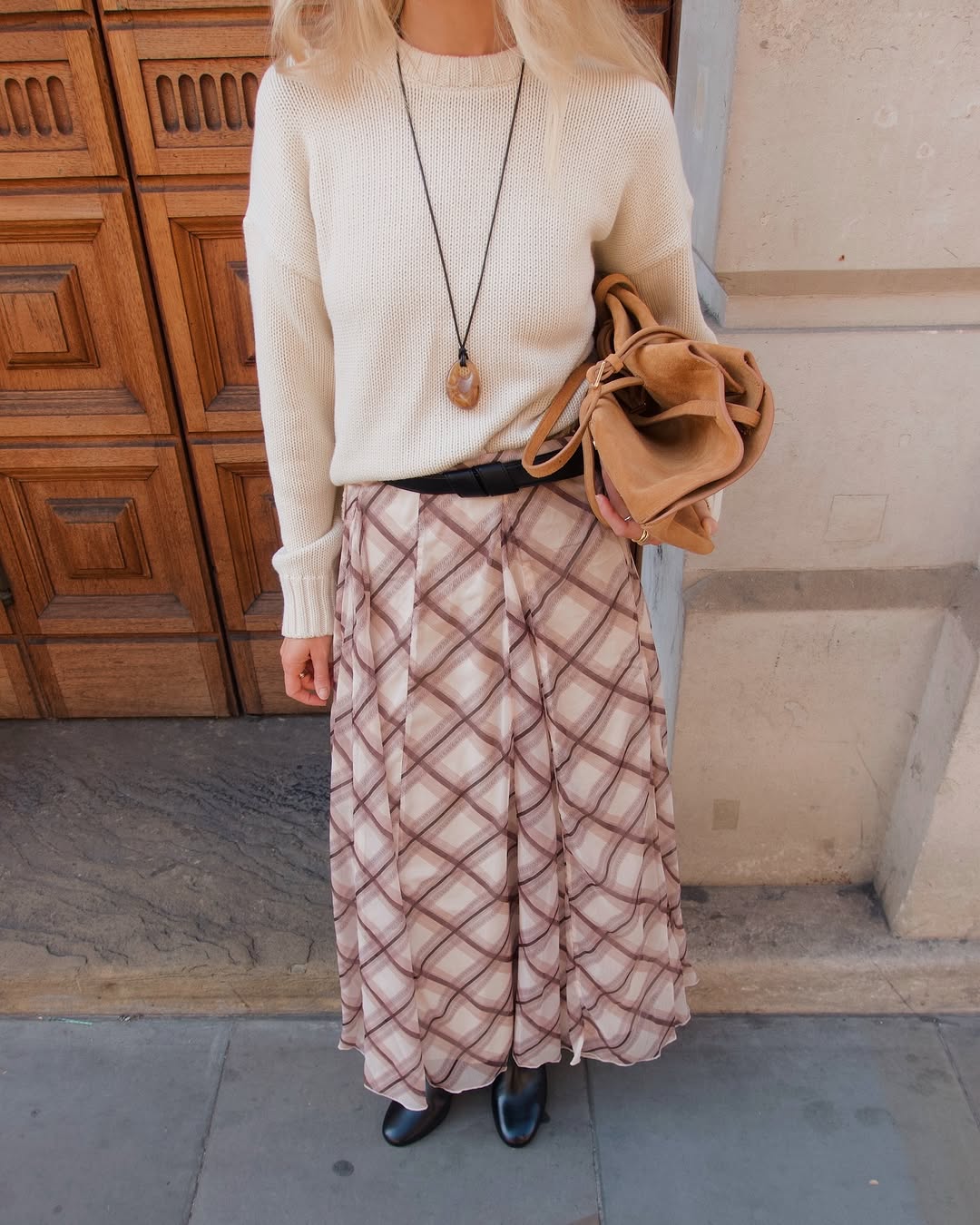 woman wearing plaid maxi skirt outfit 2025