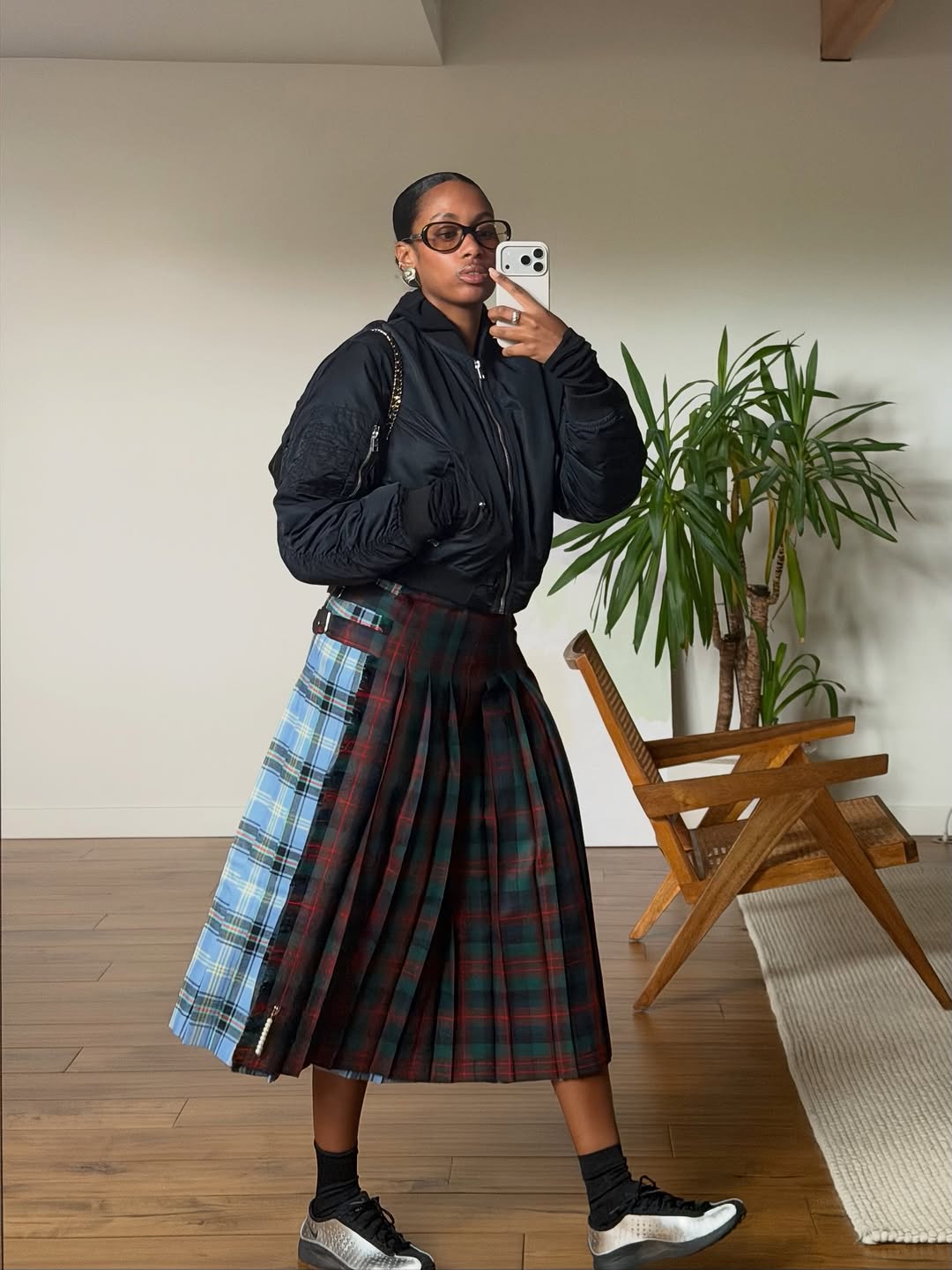 woman wearing plaid maxi skirt outfit 2025
