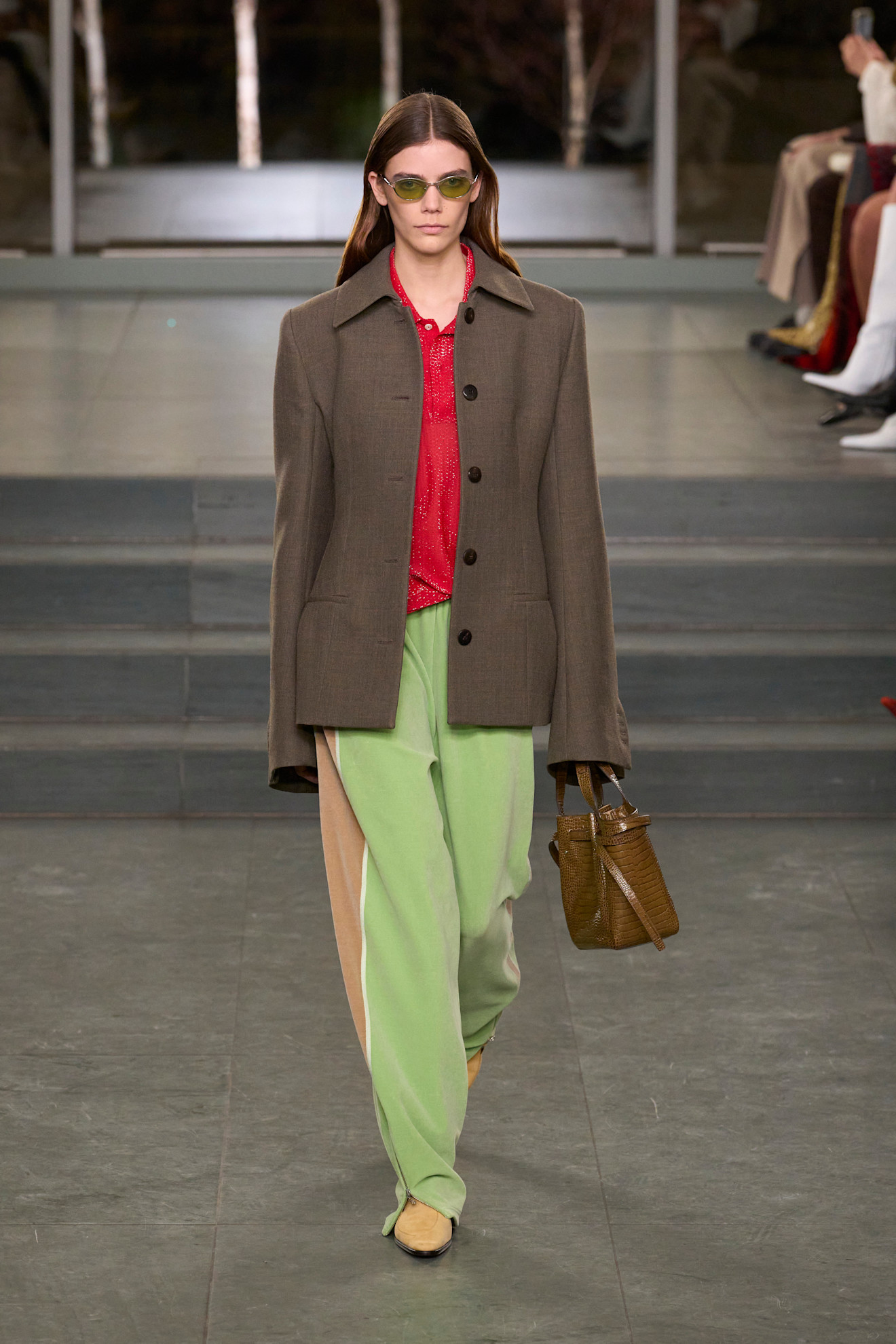 Tory Burch fall/winter 2025 runway featuring the track pants trend