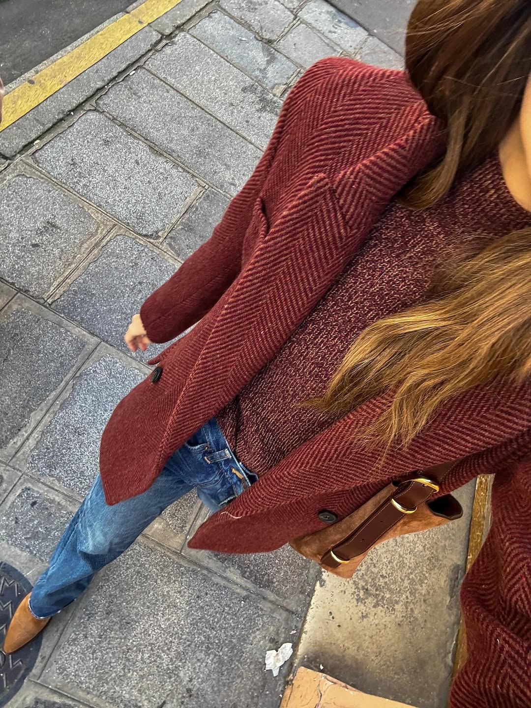 woman wearing suede pointed toe ankle boots trend 2025