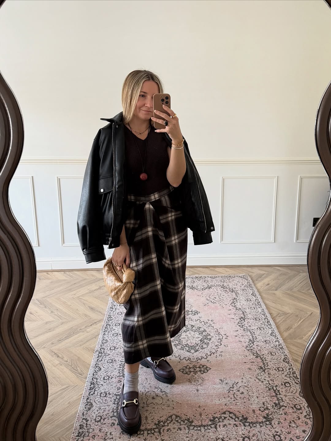 woman wearing plaid maxi skirt outfit 2025