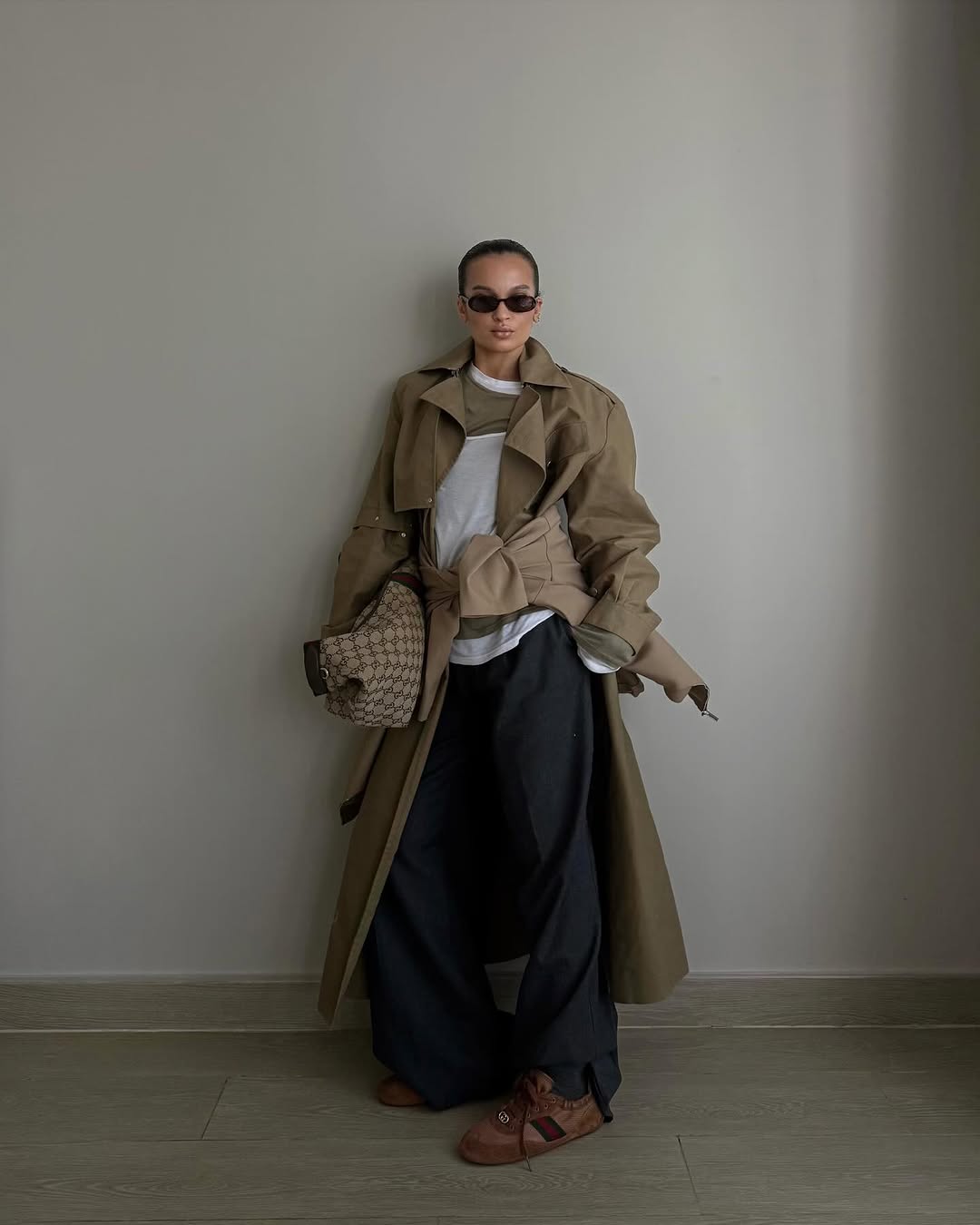 woman wearing winter sneaker outfit 2025