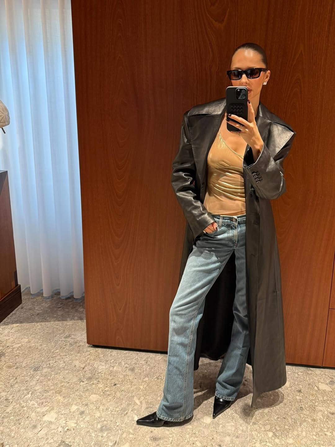 woman wearing cigarette jeans trend 2025