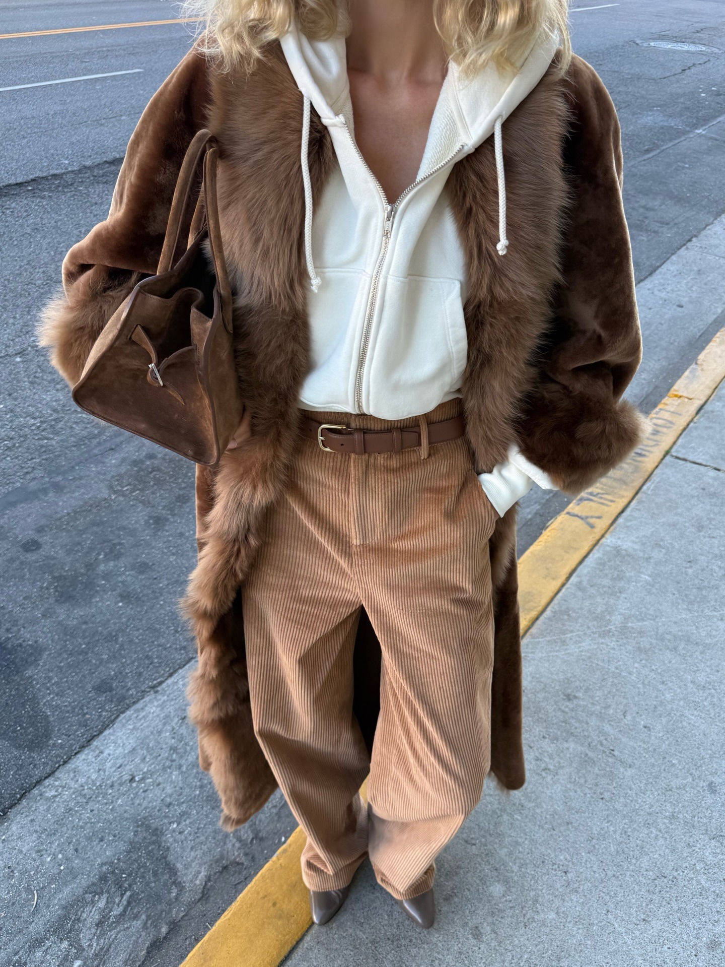 Influencer wearing a fur coat