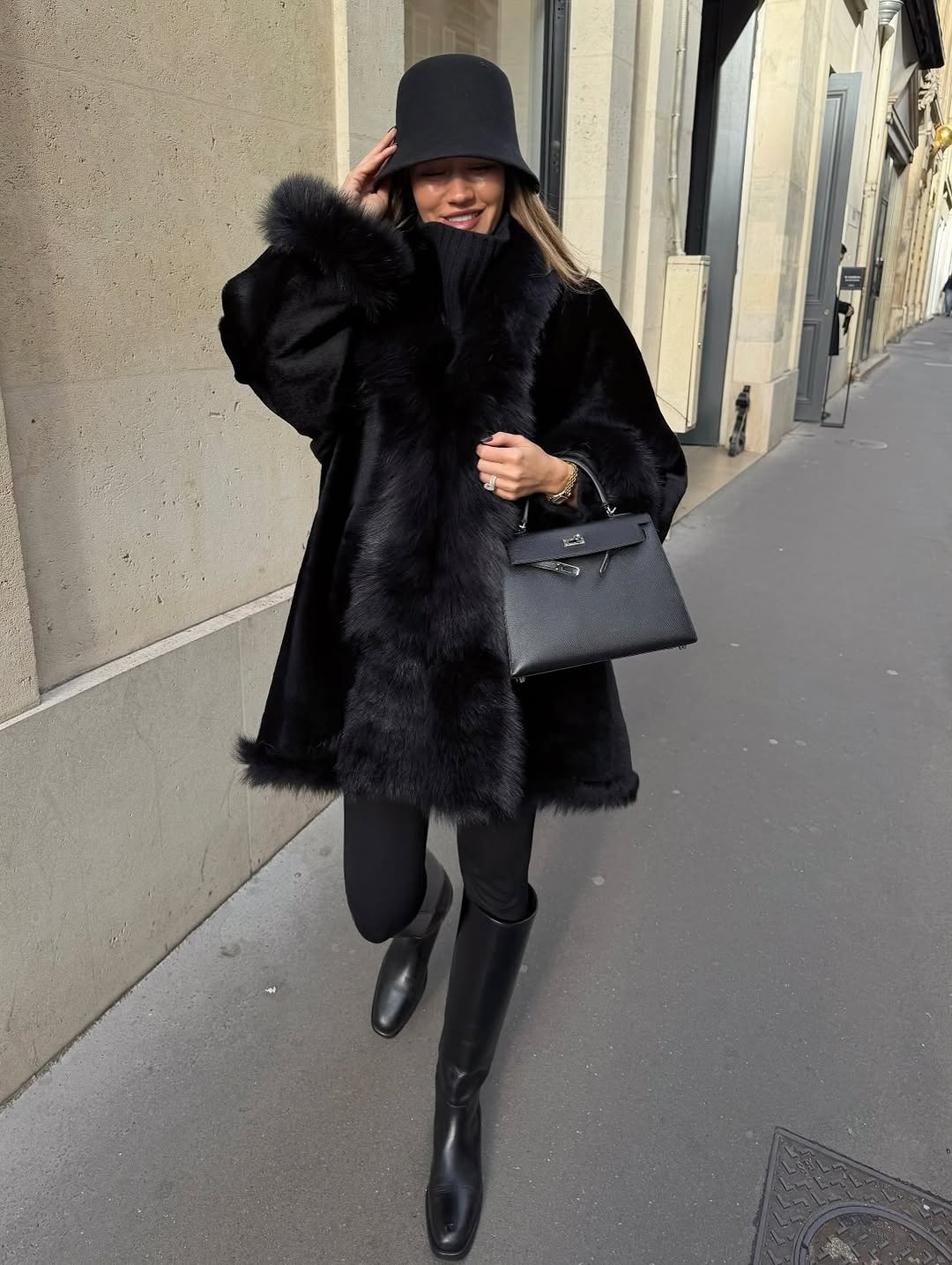 woman wearing leggings with boots outfit 2026