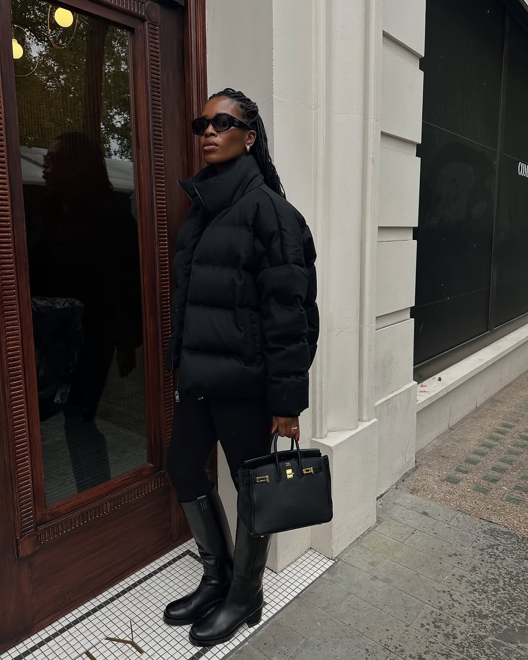 woman wearing leggings with boots outfit 2026