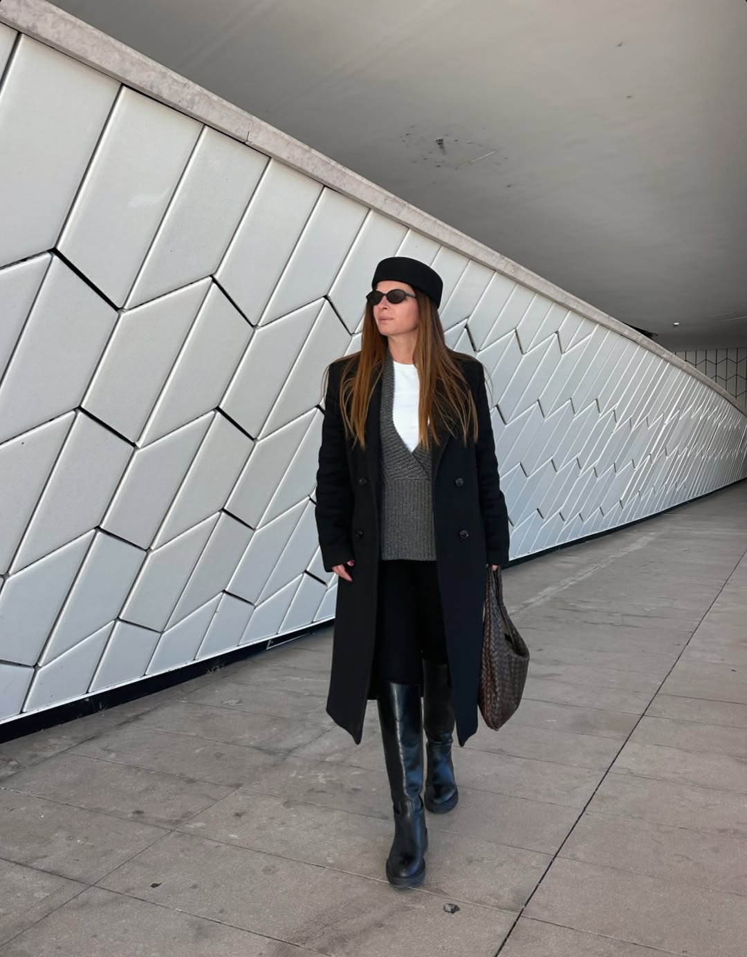 woman wearing leggings with boots outfit 2026