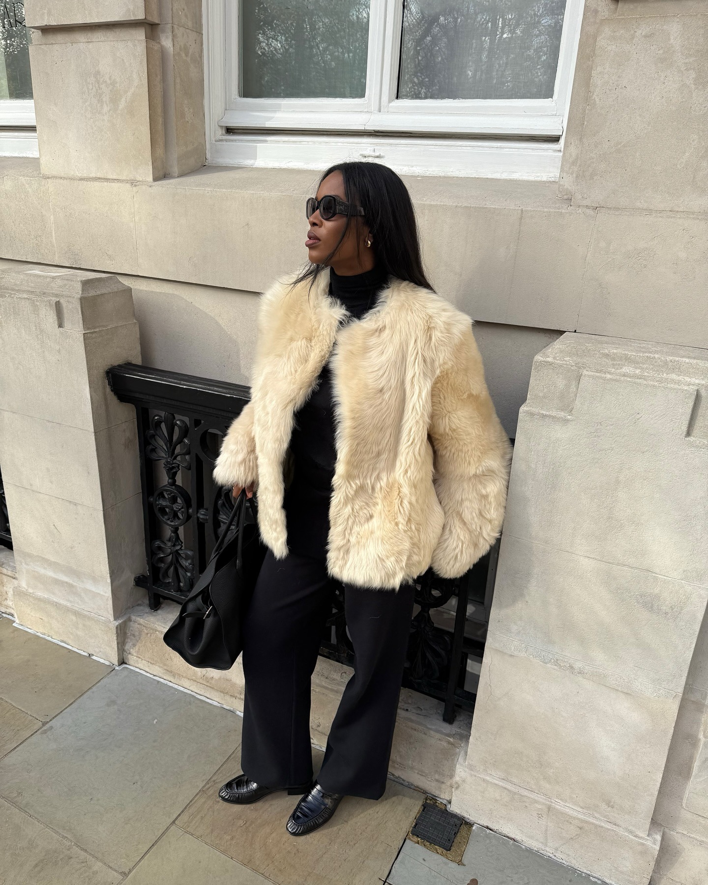 Influencer wearing a fur coat