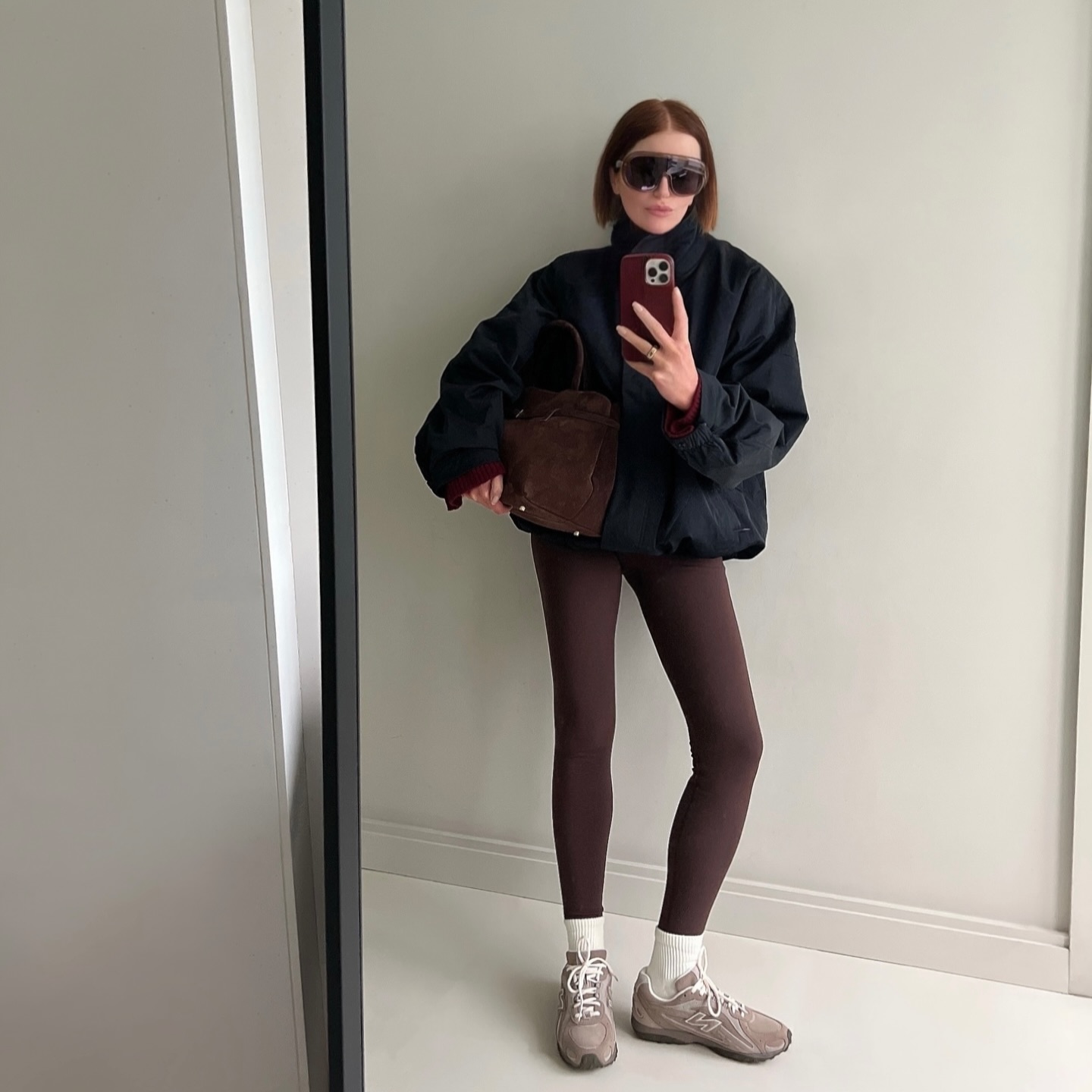 @honeybelleworld in the winter legging outfit trend.