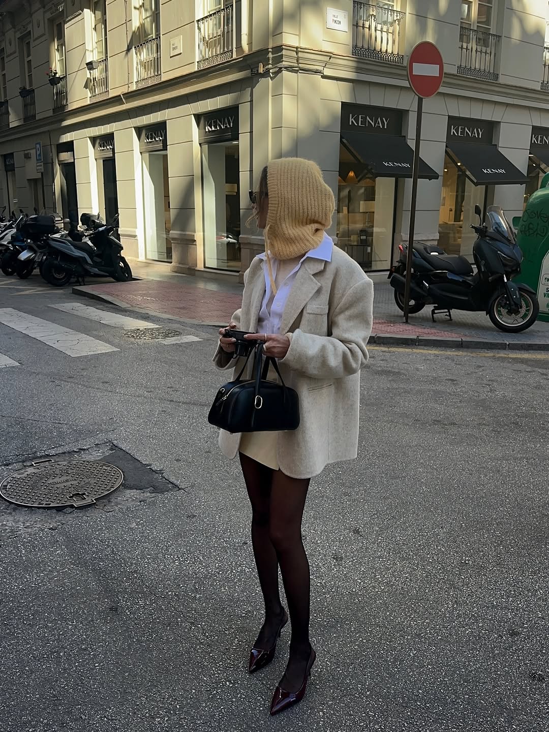 Woman wearing miniskirt with tights outfit 2026.